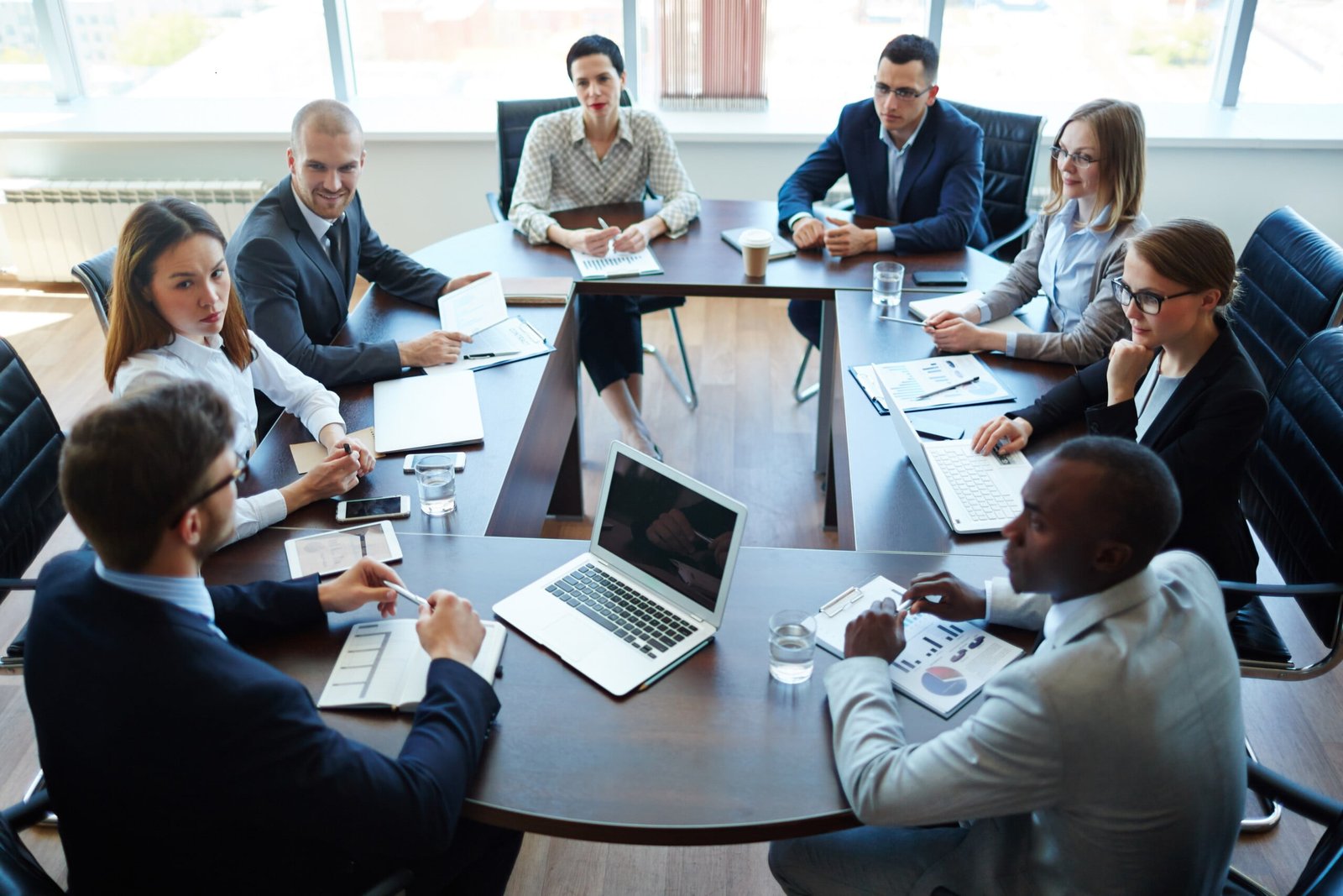 Busines people at panel discussion in board room